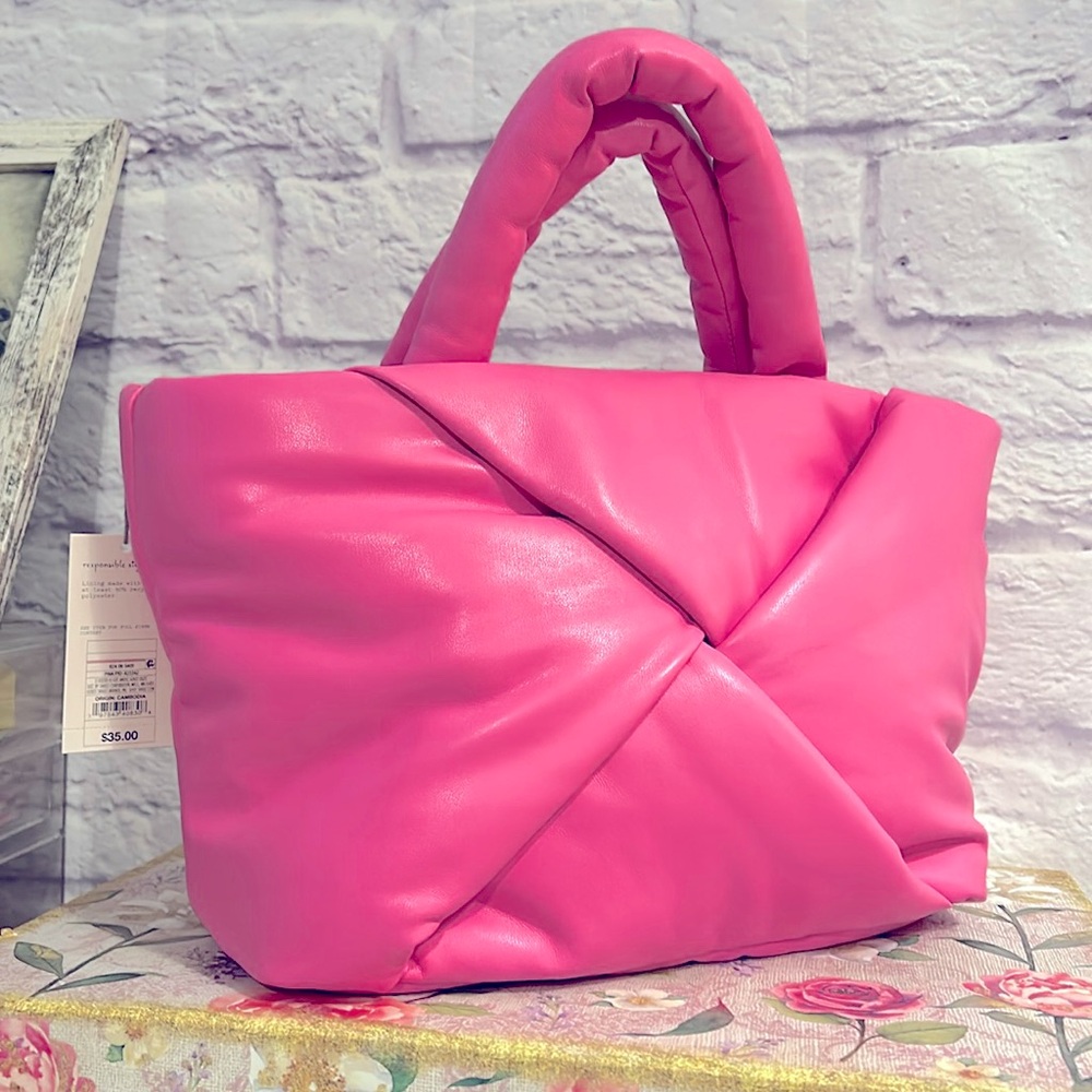 A new day Pink Puff bag. No strap nwt